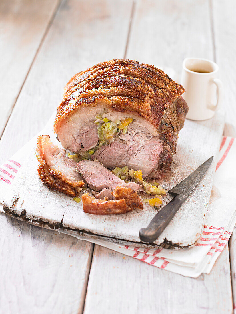 Slow roasted pork shoulder with leek, apricots, and thyme