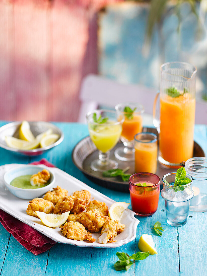 Breaded Amritsari fish (Indian style battered fish), melon-ginger sharbat