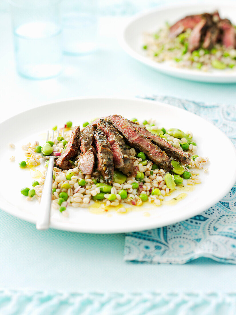 Marinated rack of lamb on a barley salad