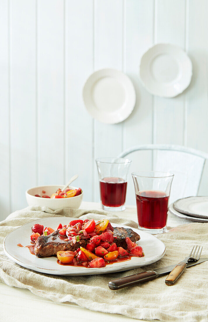 Steak with a strawberry-and-tomato salsa