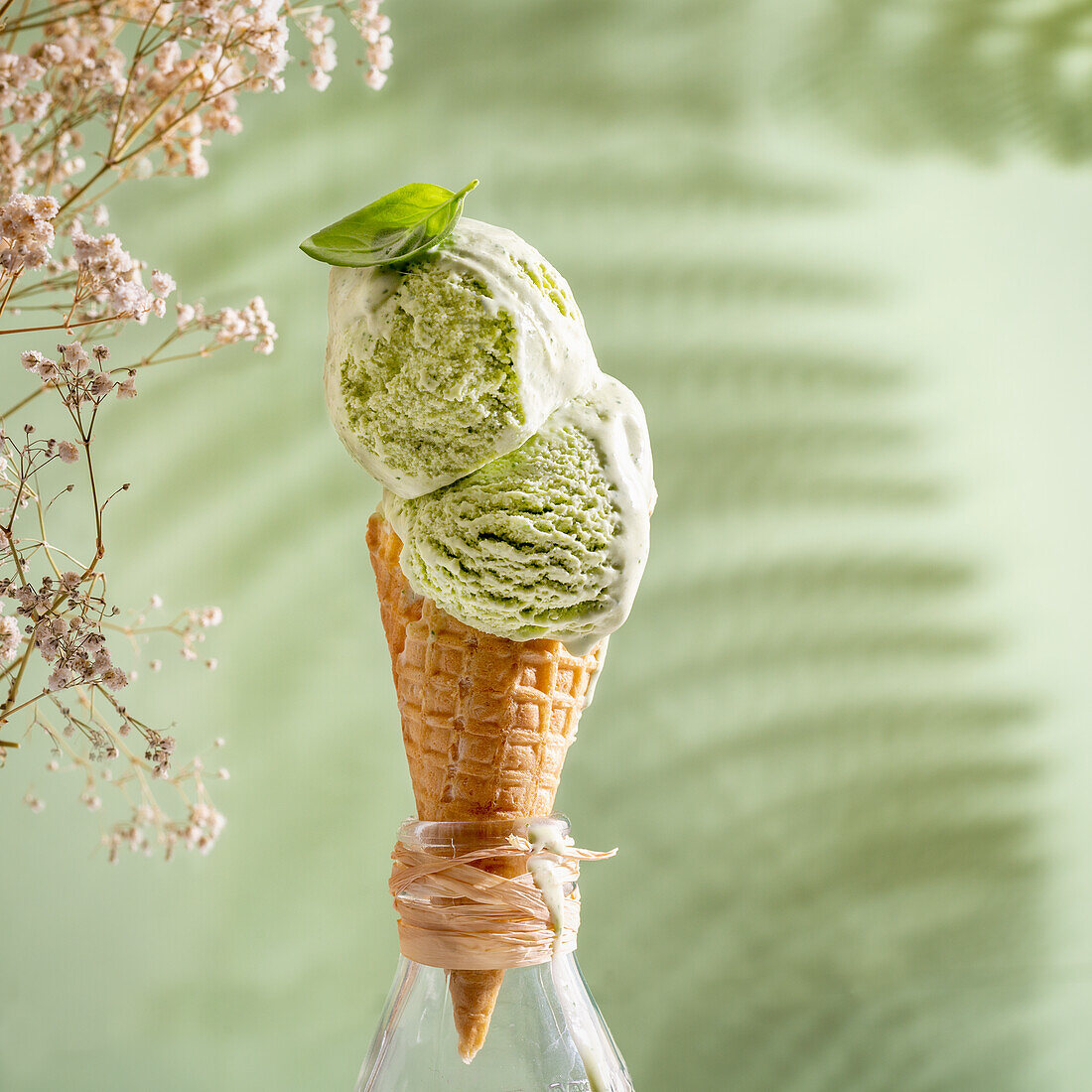Basil ice cream in a cone