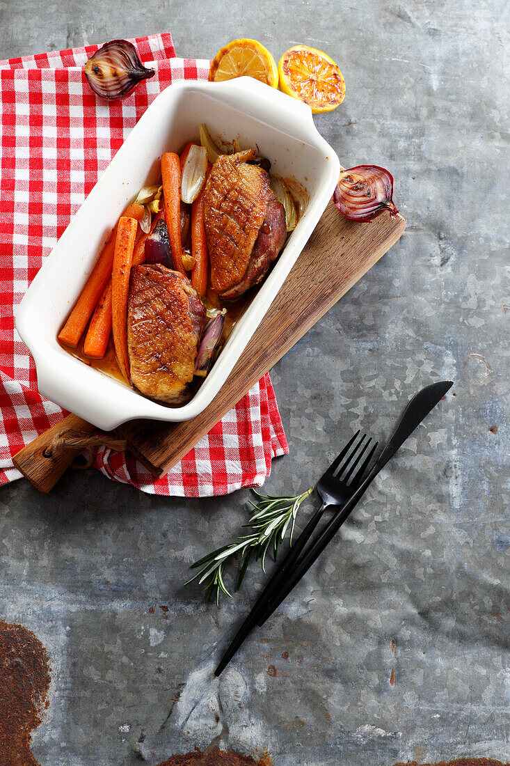 Roast duck breast with young carrots