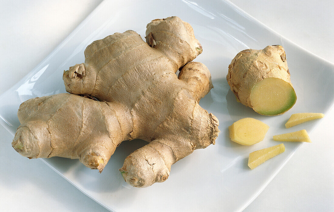 Ginger root on a white plate