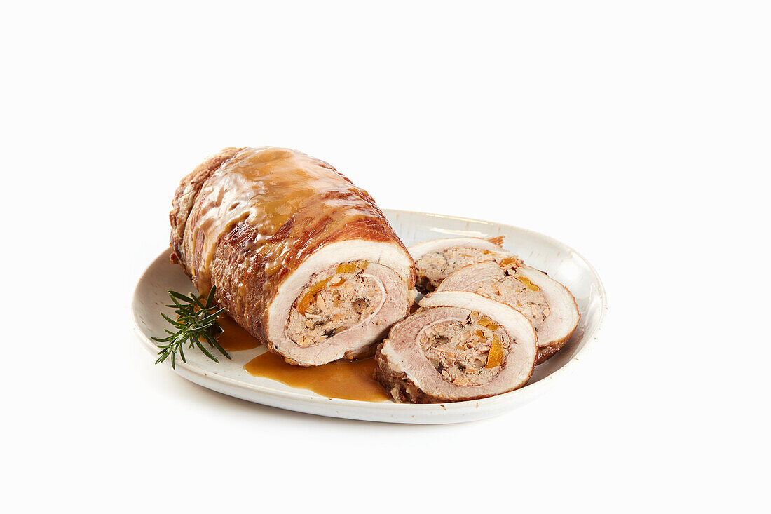 Schweineroulade mit Pfirsichen und Nüssen