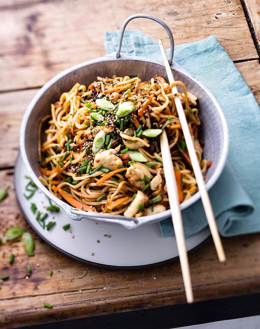 Chicken, shive, noodles, sesame seeds, carrots