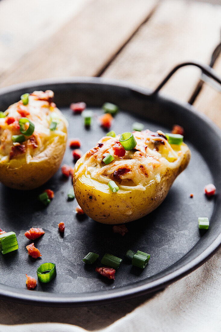 Stuffed potatoes with bacon and sour cream
