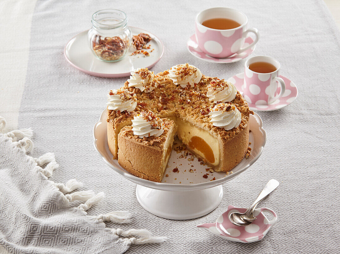 Peach cheesecake with caramelized nuts