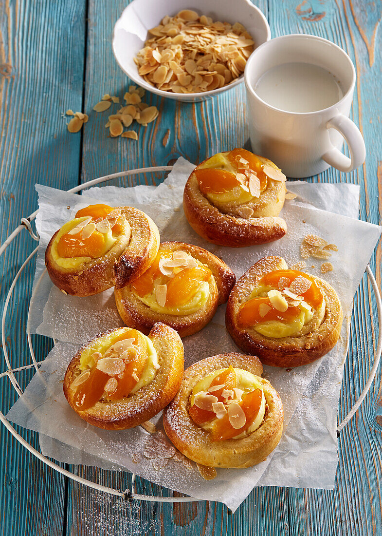 Baked vanilla pudding and peach rolls