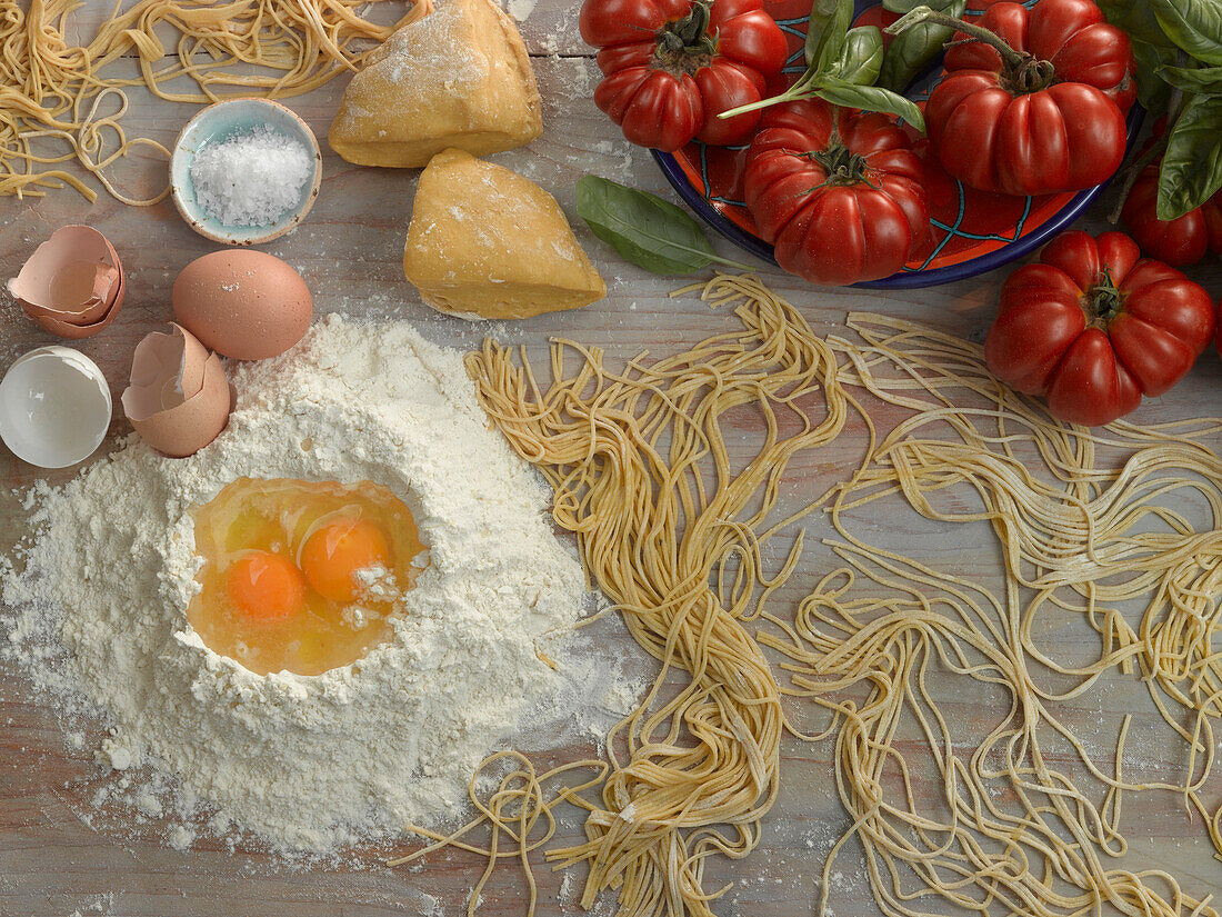 Homemade pasta, pasta ingredients and beefsteak tomatoes