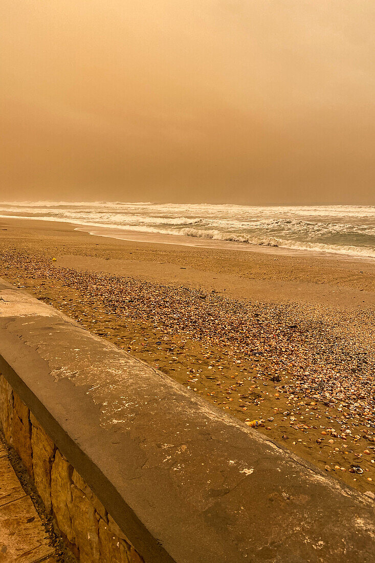 Haze covering beach, Mdiq, Morocco