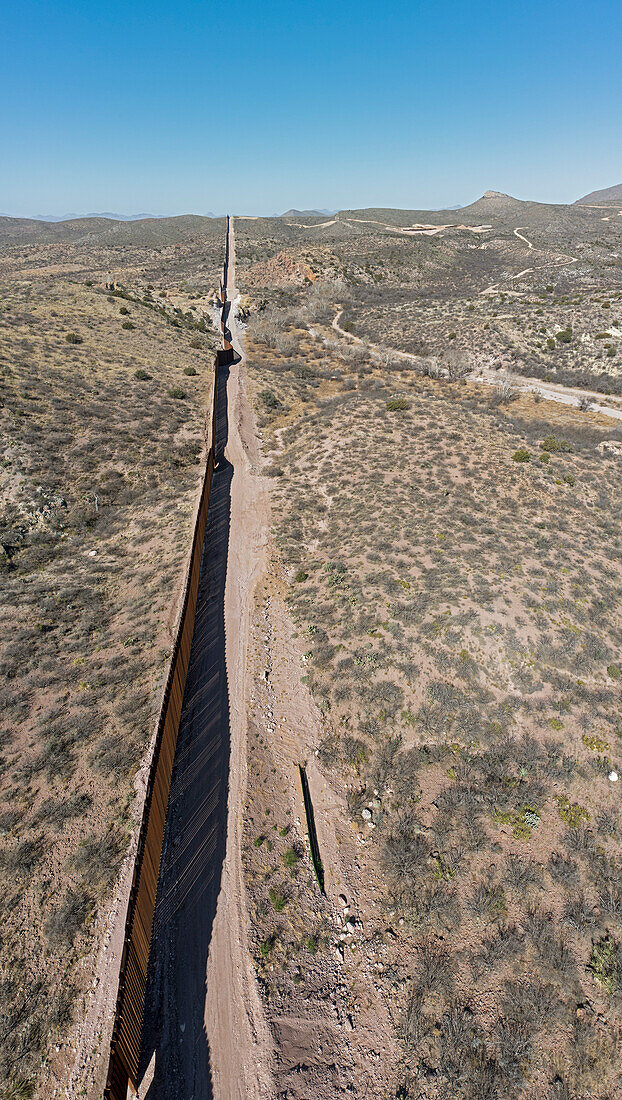 US-Mexico border fence in Guadalupe Canyon