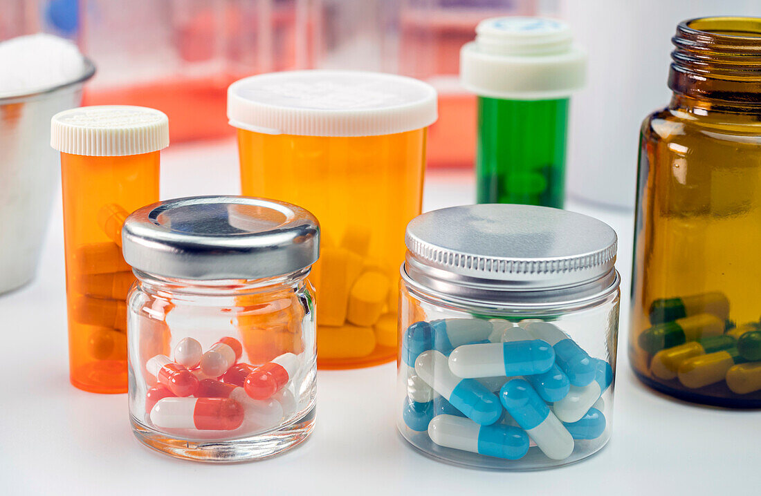 Jars containing different types of pills