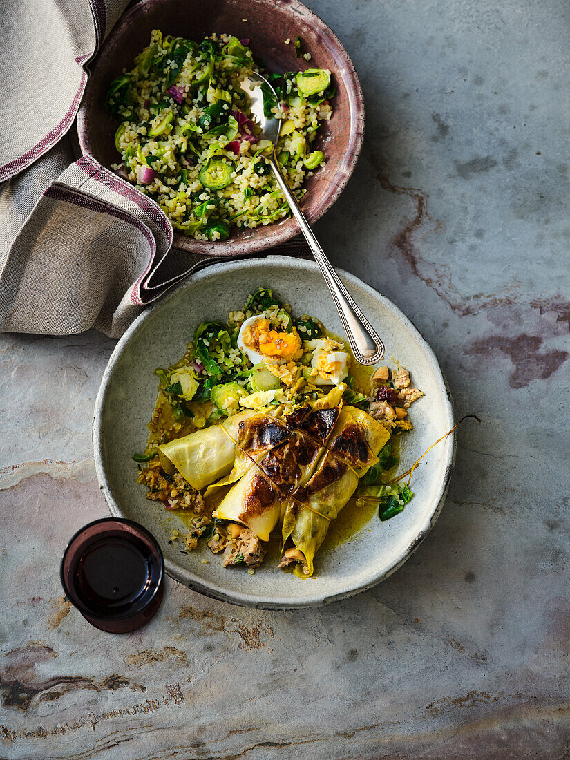 White cabbage roulades braised in saffron with brussels sprouts and bulgur wheat