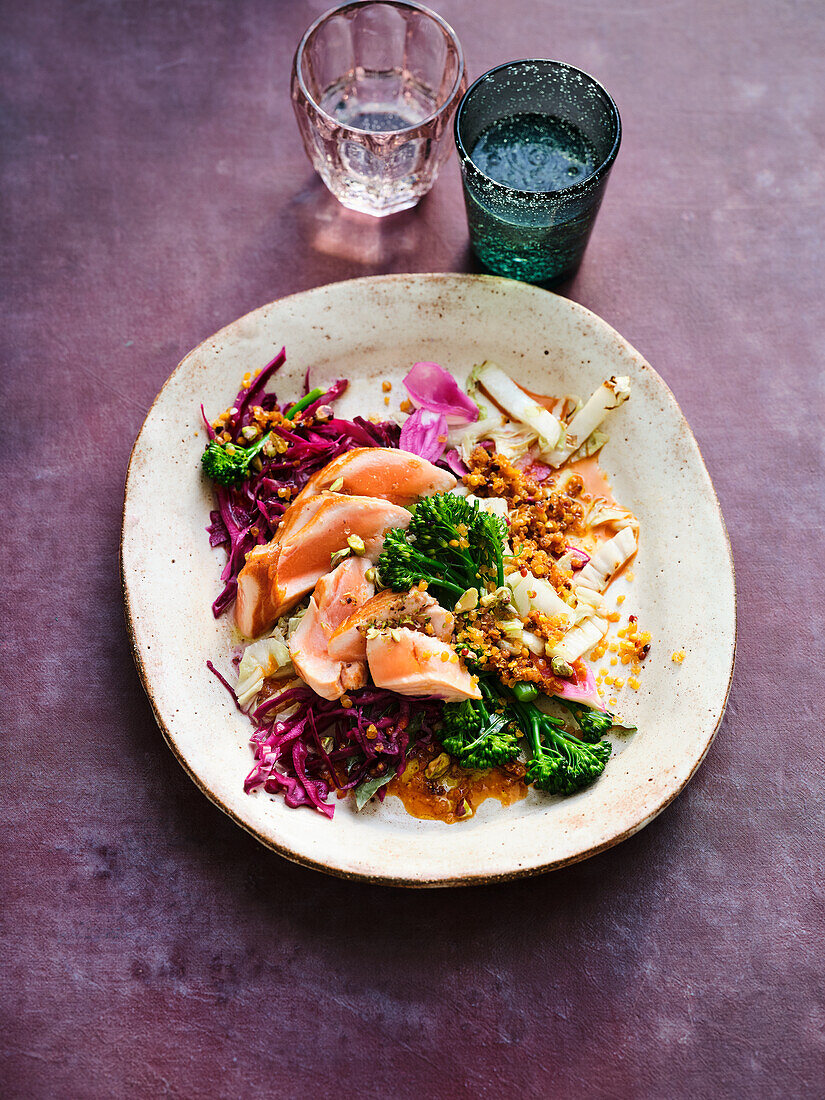 Coloured cabbage salad with salmon and harissa lentil vinaigrette