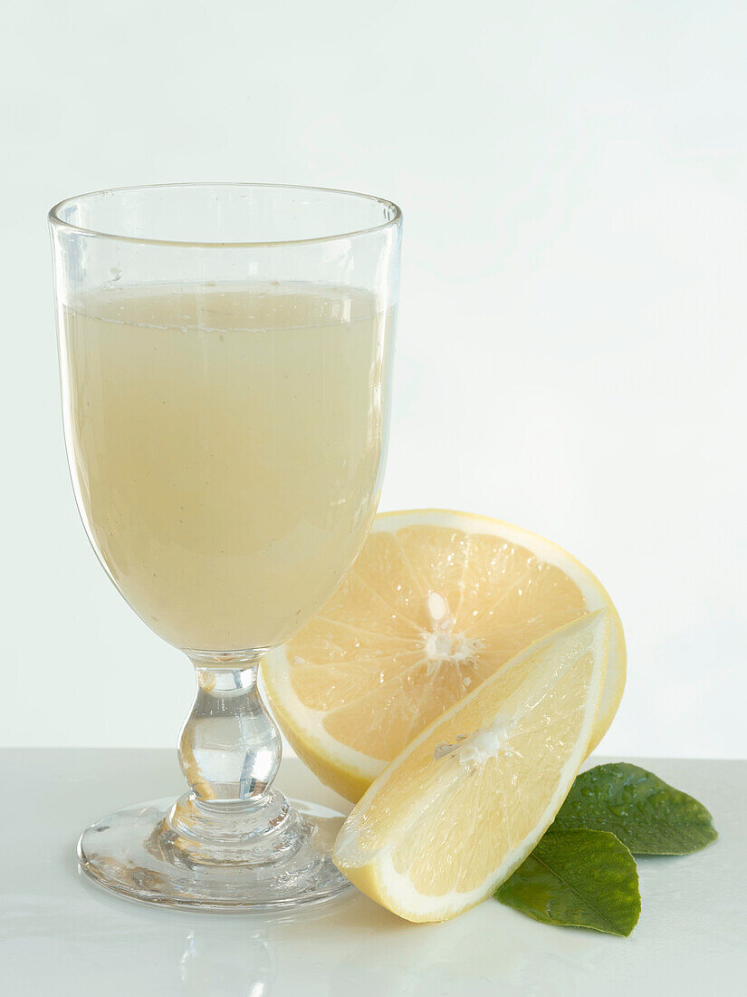 A glass with grapefruit juice