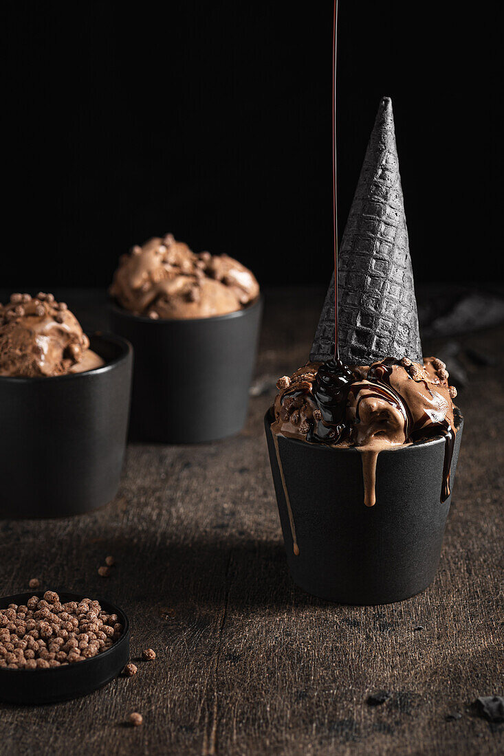 Chocolate ice cream with chocolate sauce