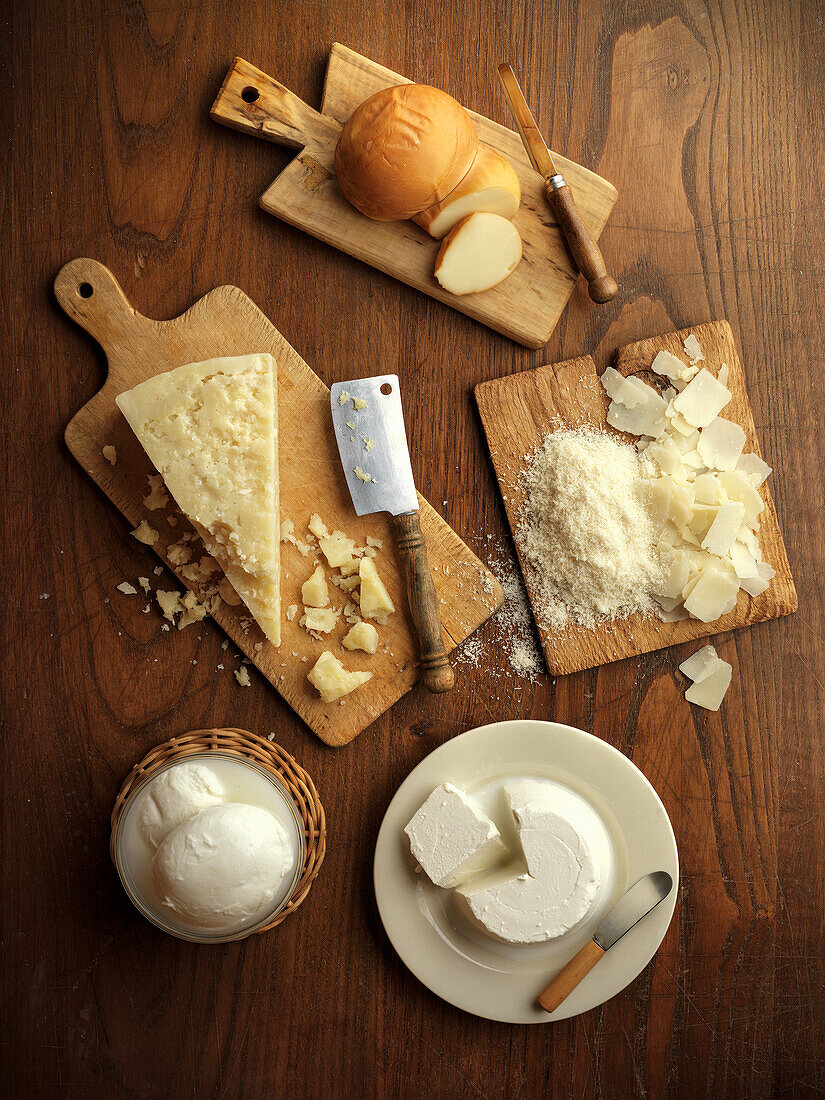 A still life of Italian cheeses
