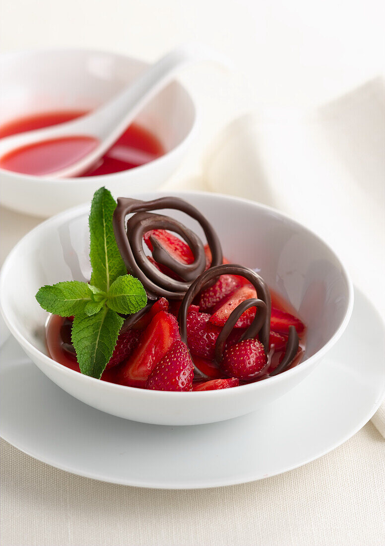 Strawberry dessert with chocolate and mint