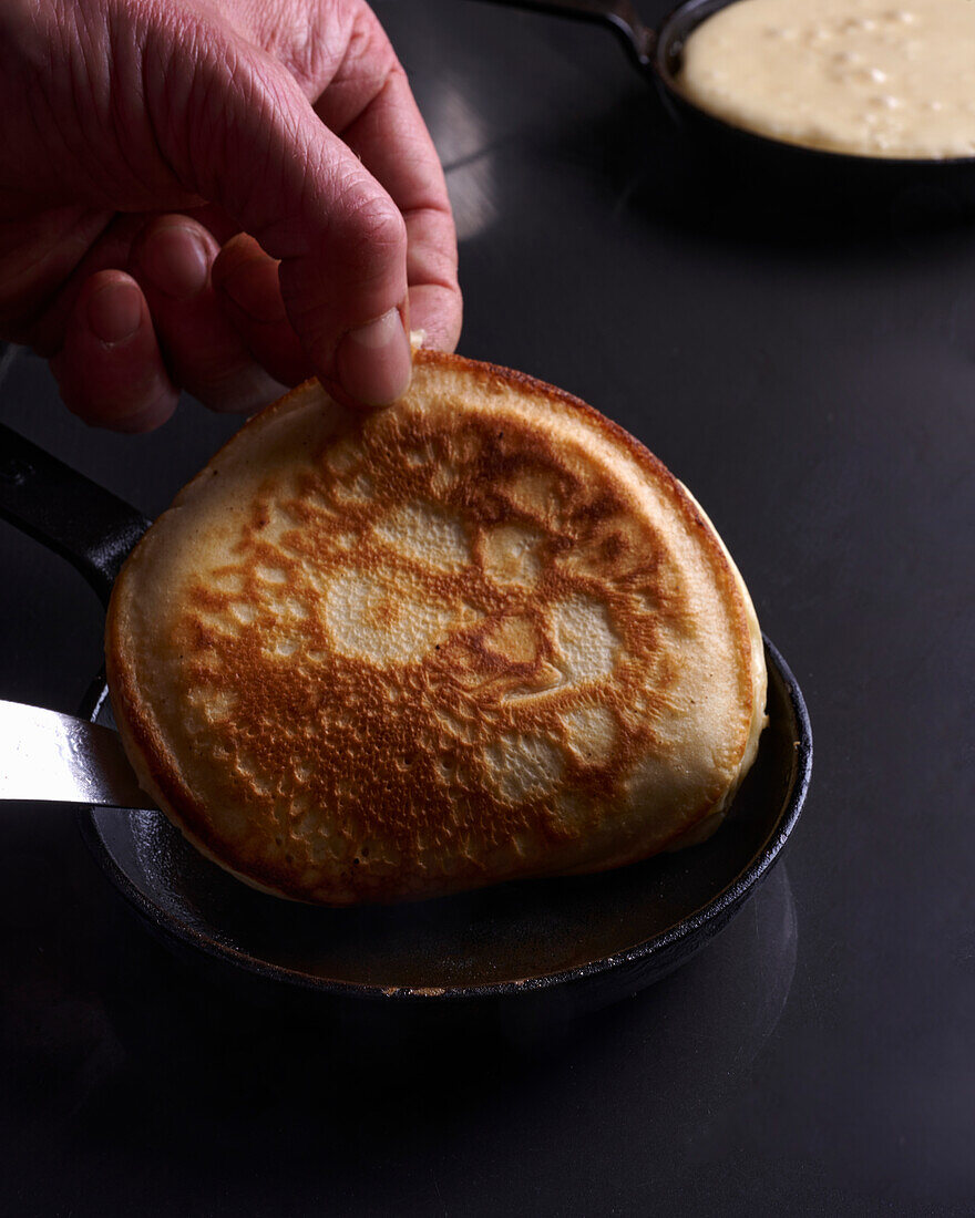 Freshly baked blini in the pan