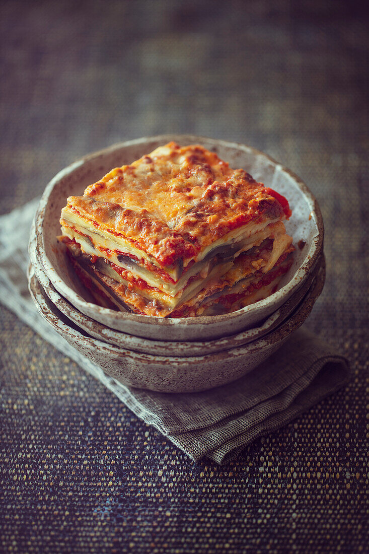 Aubergine casserole with tomatoes, mozzarella and hard cheese (vegetarian, low carb)