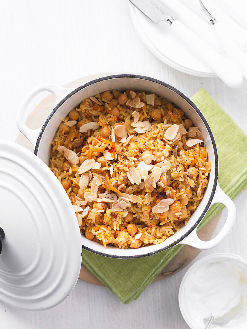 Pilaf with spiced carrots, chickpeas, and almonds