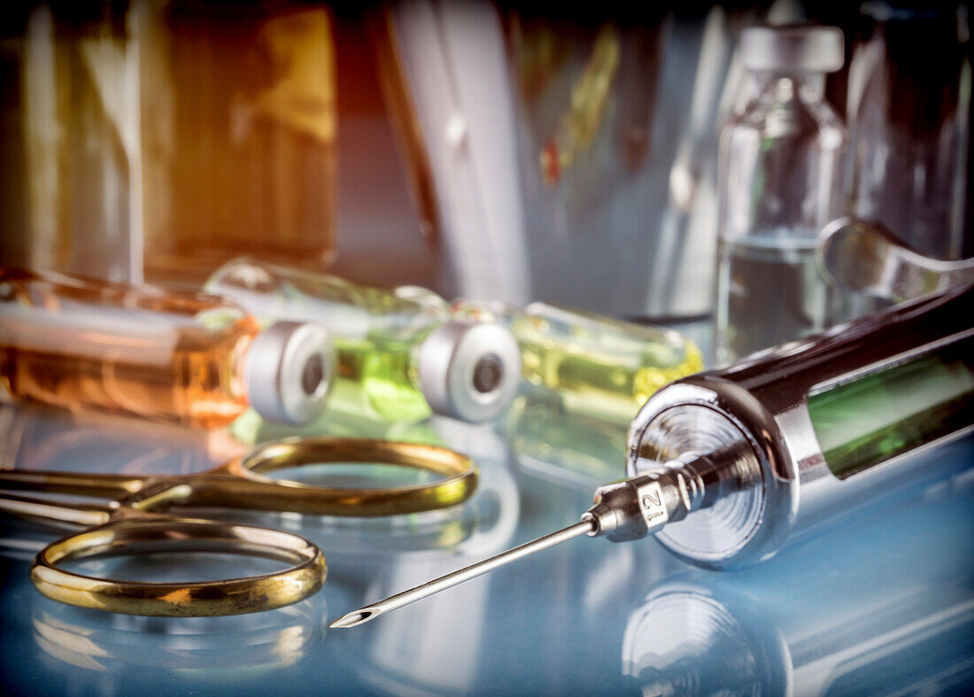 Vials and utensils in an operating theater, conceptual image