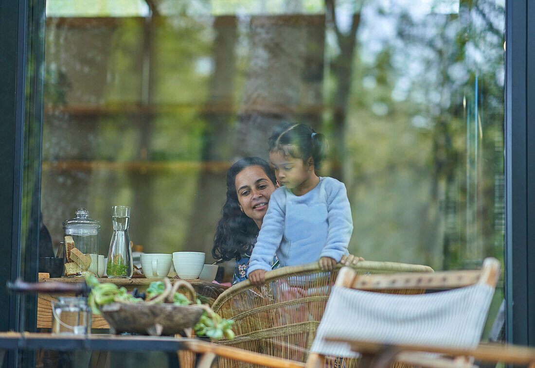 Mother and daughter at dining table