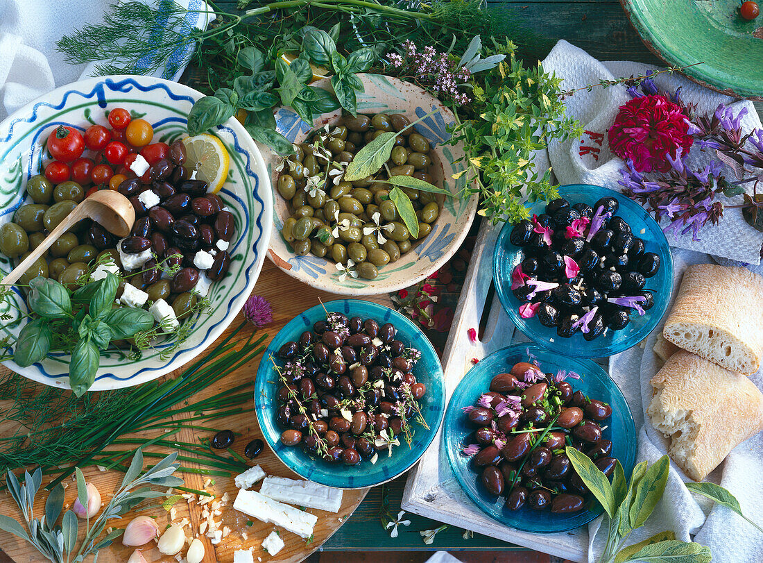 Various olives with herbs and feta cheese