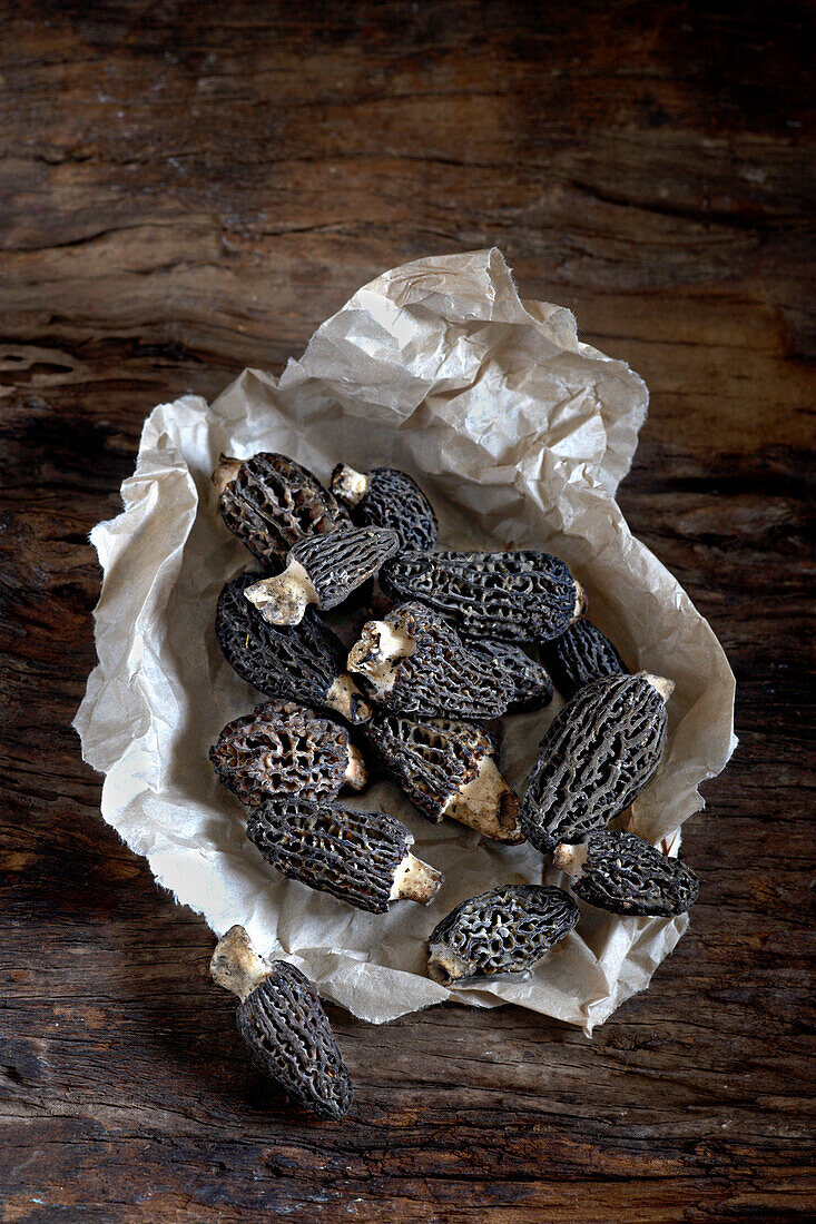 Morels on a crumpled piece of paper