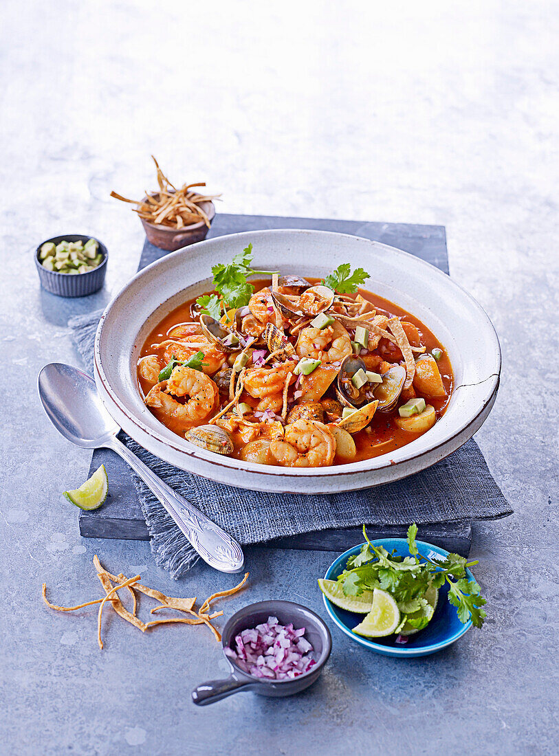 Spicy seafood stew with tomato and lime