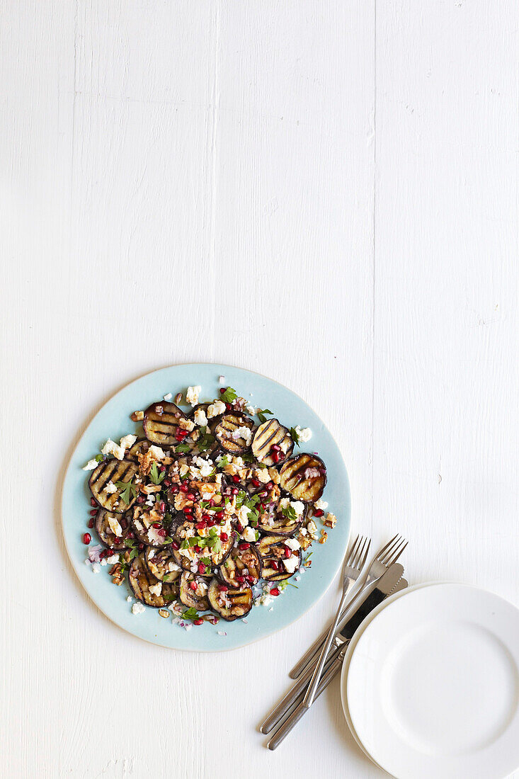 Grilled eggplant with feta and pomegranate
