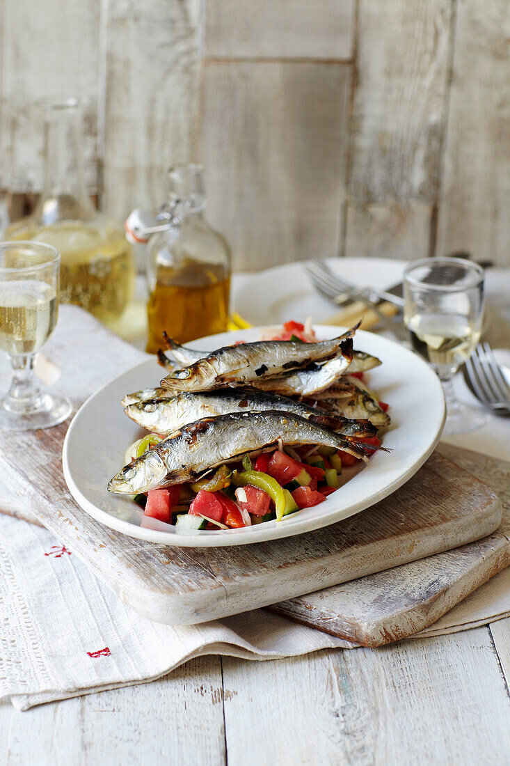 Grilled sardines with tomato and pepper salsa