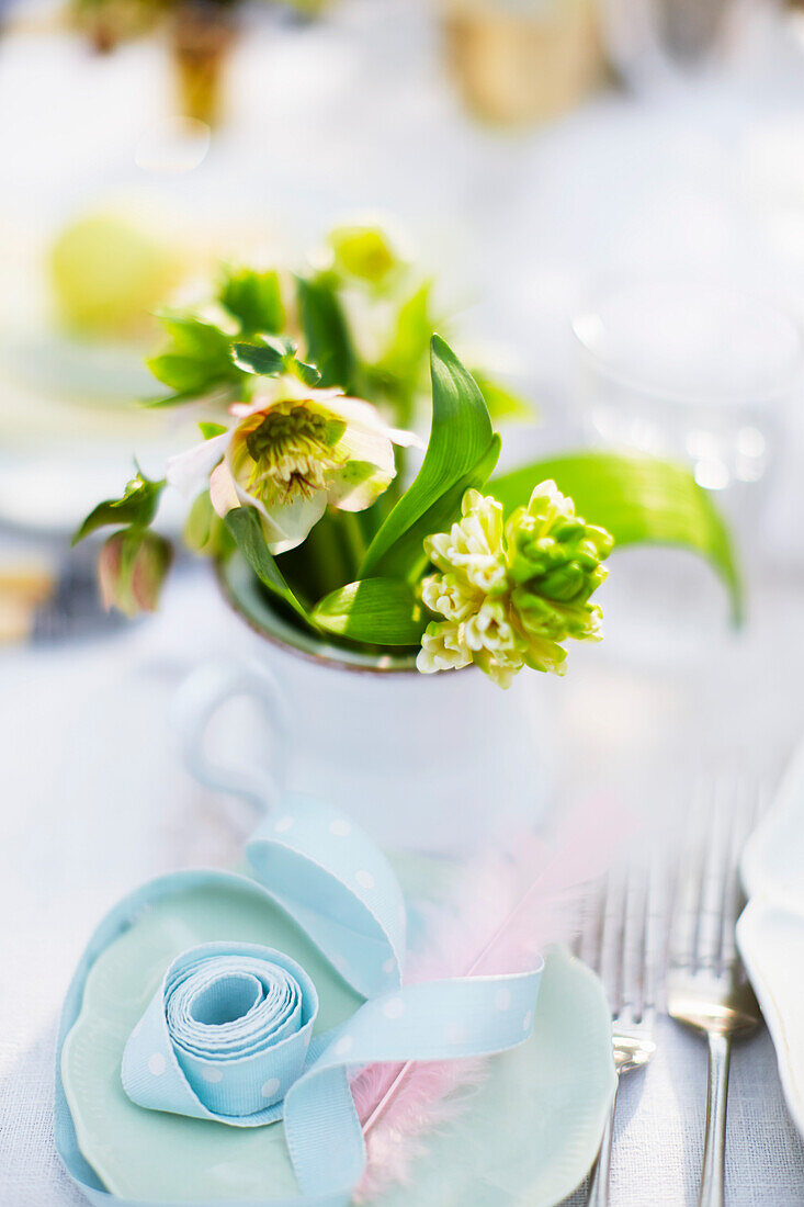 An Easter place setting with flowers
