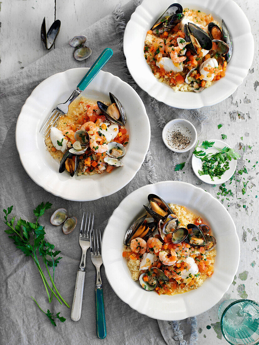 Seafood stew served on couscous