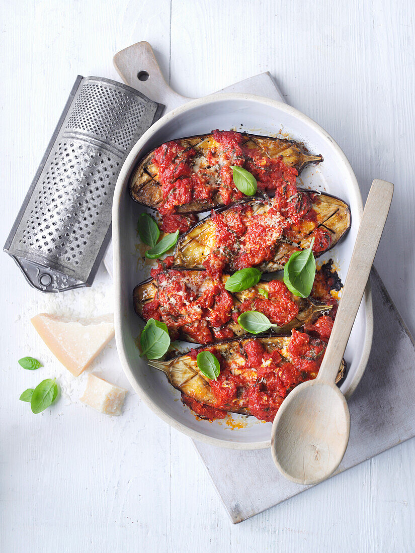 Baked eggplant with tomato sauce and basil (Italy)