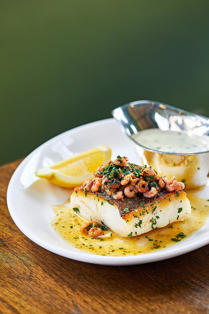 Roasted cod with brown shrimp and parsley sauce