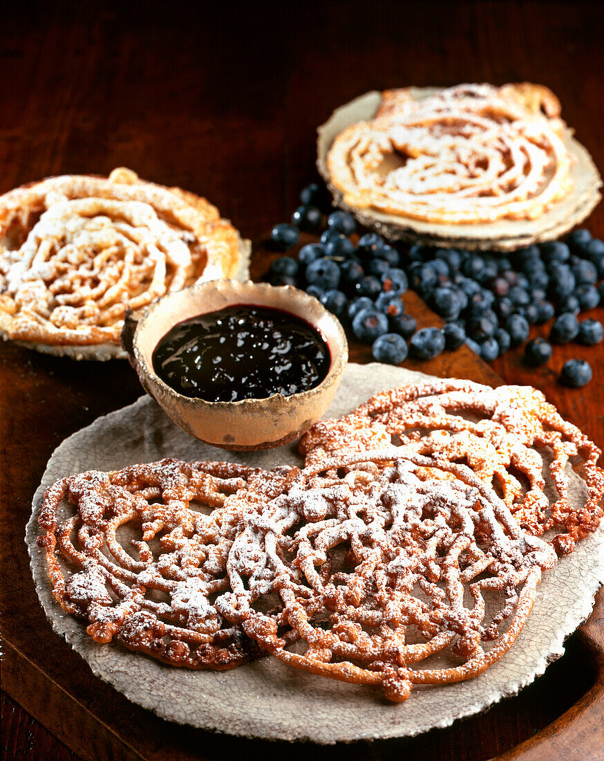 Fortaies (spiral pastries, Cortina d'Ampezzo, Italy) with blueberry sauce
