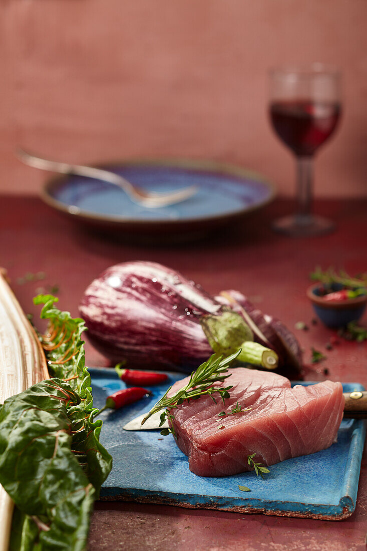 Tuna, chard, striped aubergines and spices