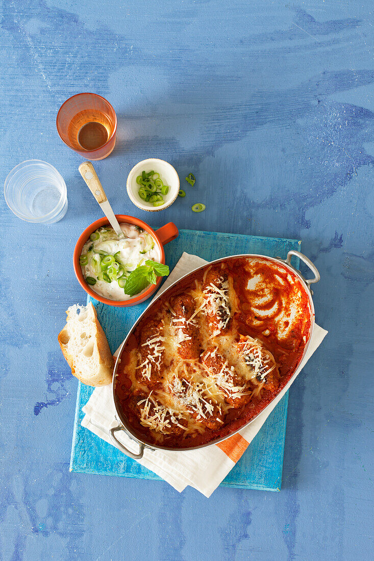 Vegan oven-roasted 'vegetable cevapcici' with soy tzatziki