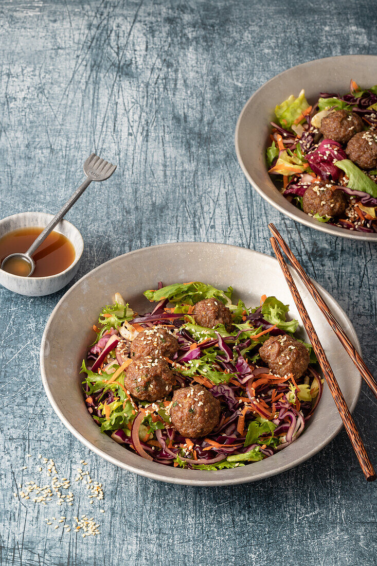Vegetarian honey and soy balls with sesame salad
