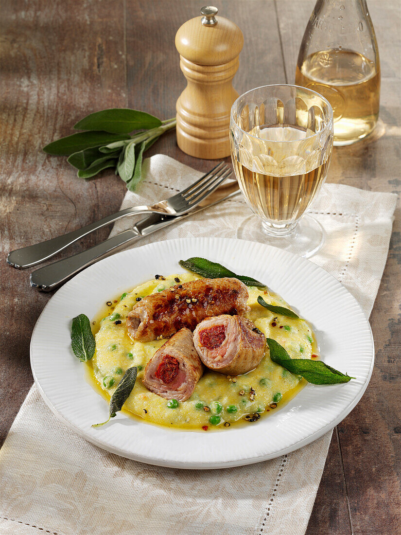 Saltimbocca rolls with lardo on polenta