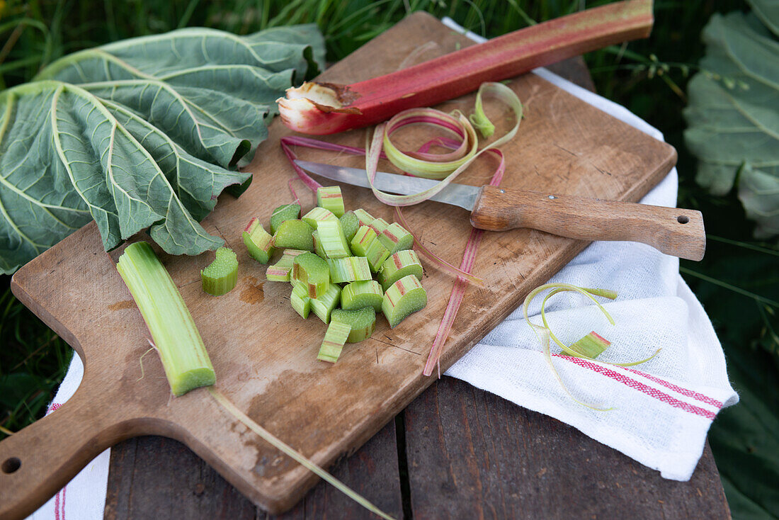 Sliced rhubarb on wooden board