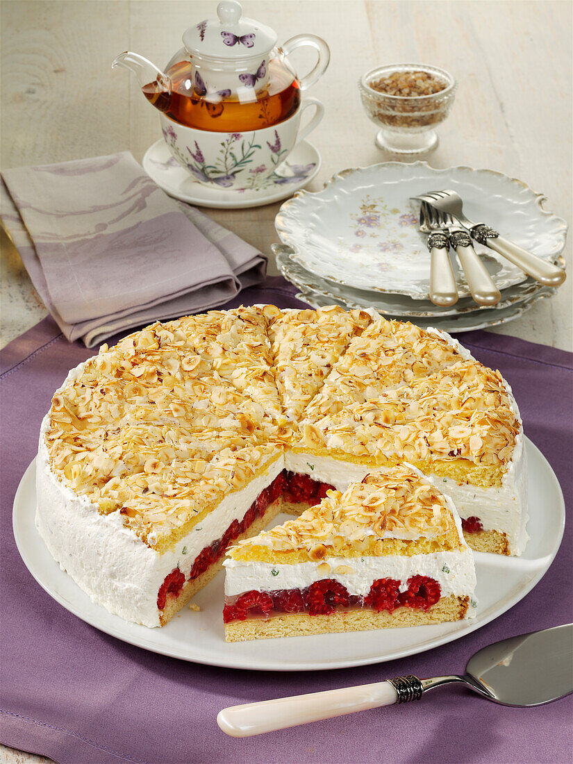 Double-layer cake with raspberries and hazelnuts