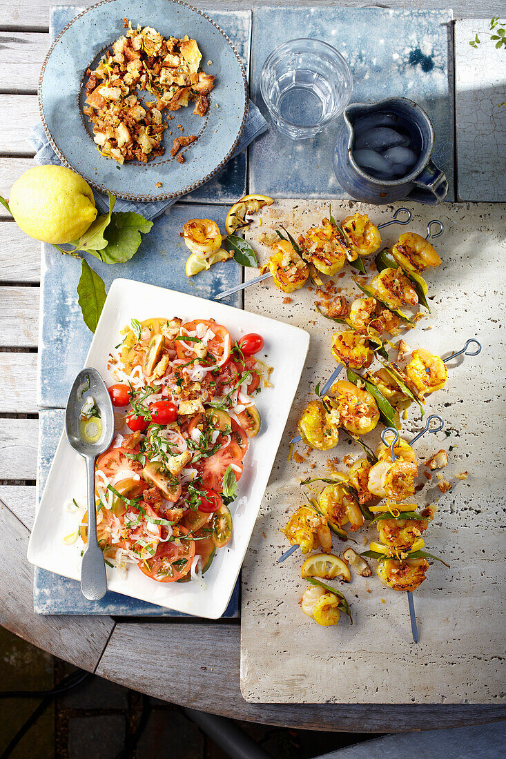 Saffron and bay prawns with lemon breadcrumbs and tomato salad