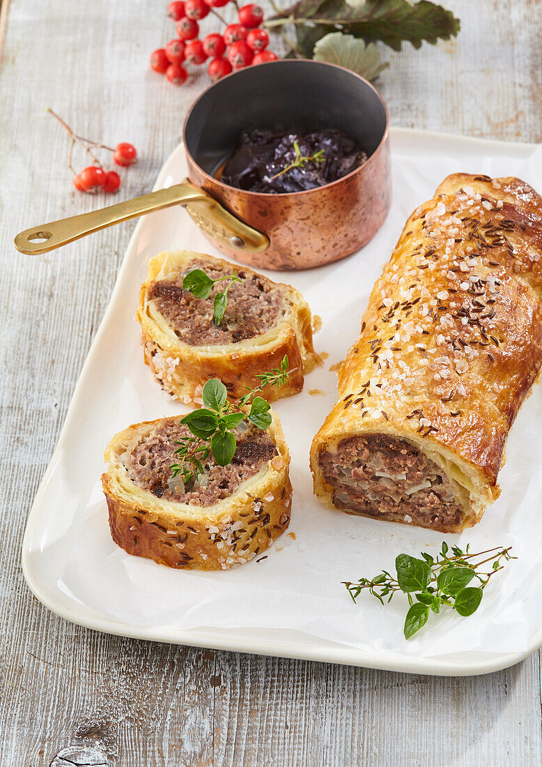 Savoury beef strudel with plums