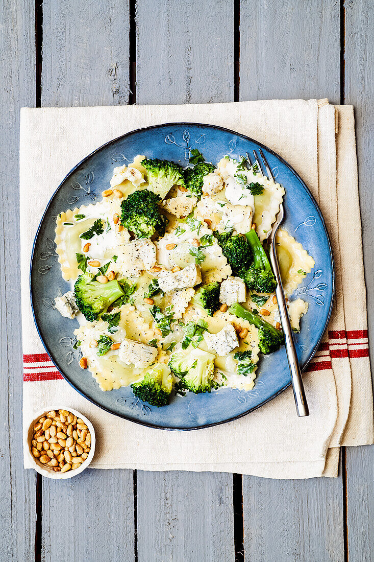 Spinach ravioli with broccoli, gorgonzola and pine nuts