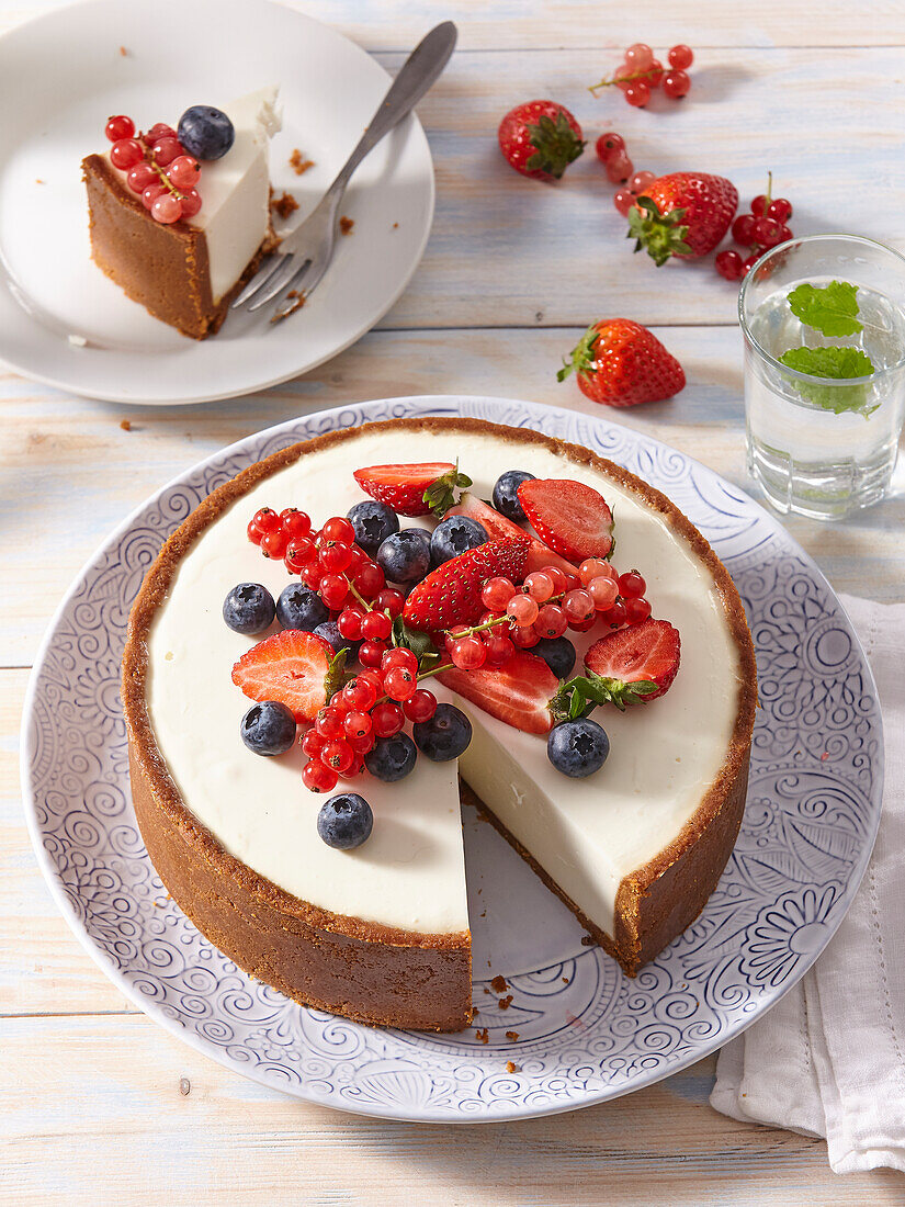 Summer cheesecake with berries, sliced