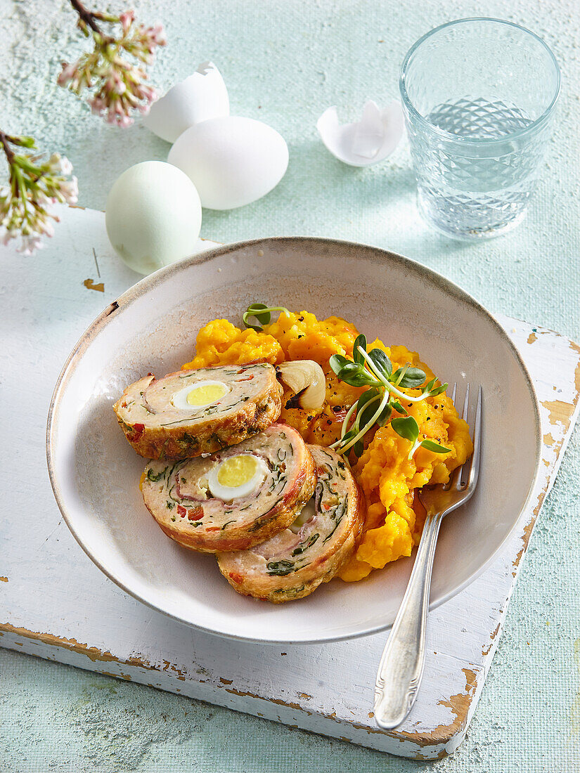 Meatloaf with spinach, herbs and hard-boiled egg