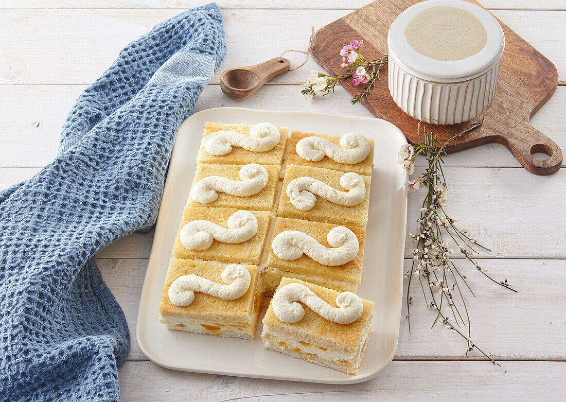 Quarkkuchenschnitten mit Mango