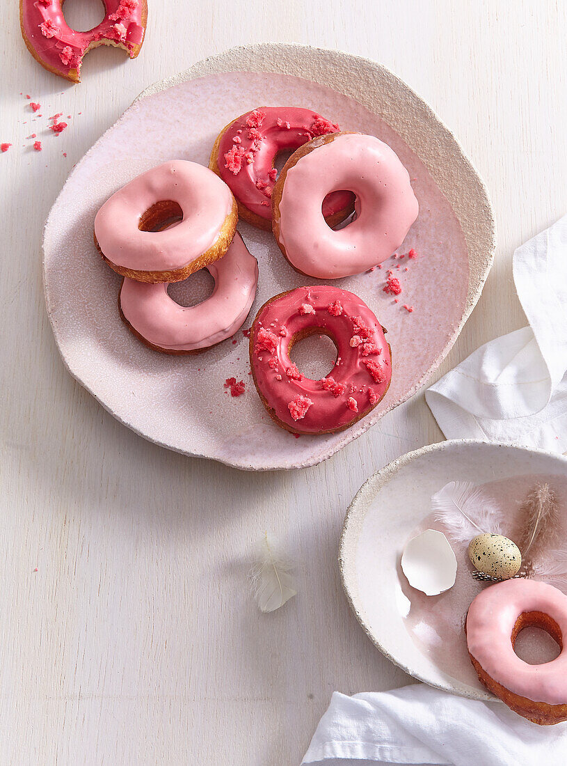 Pink and red glazed doughnuts